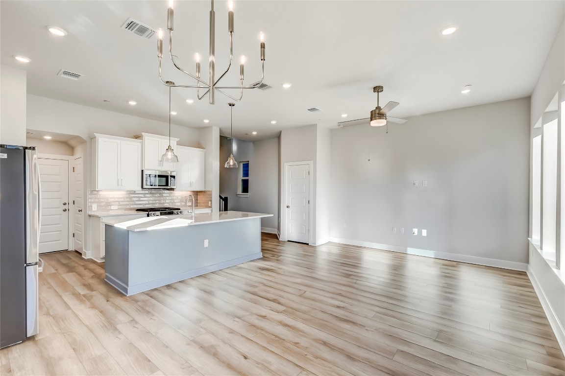 715 Bernese Pass Austin, TX 78745 - Photo 9 of 38 There will be a refrigerator and washer and dryer included.