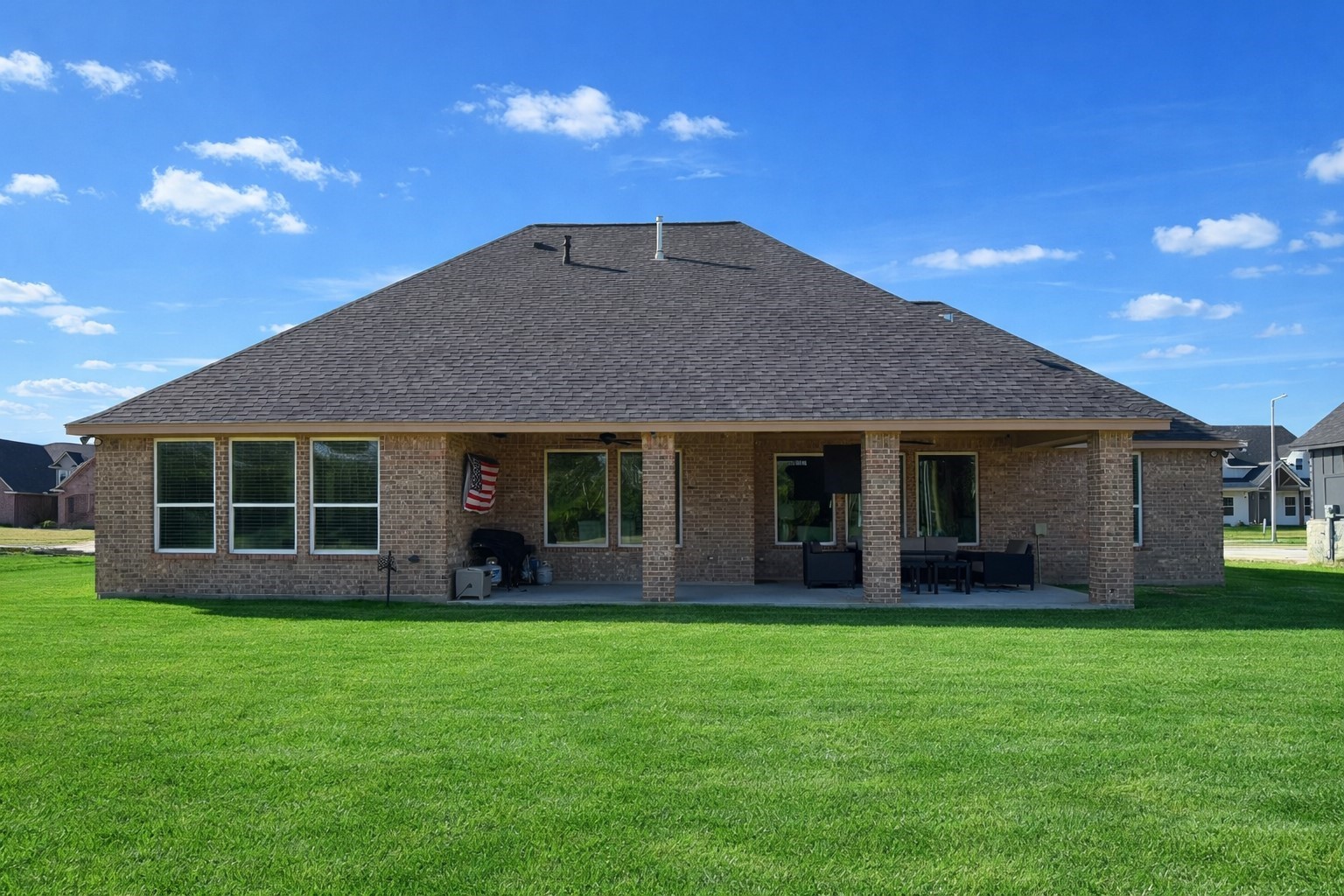 838 Oak Ridge Drive Angleton, TX 77515 - Photo 43 of 49 a front view of a house with a yard and garage