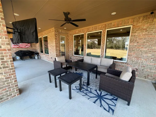 a room with furniture and a window