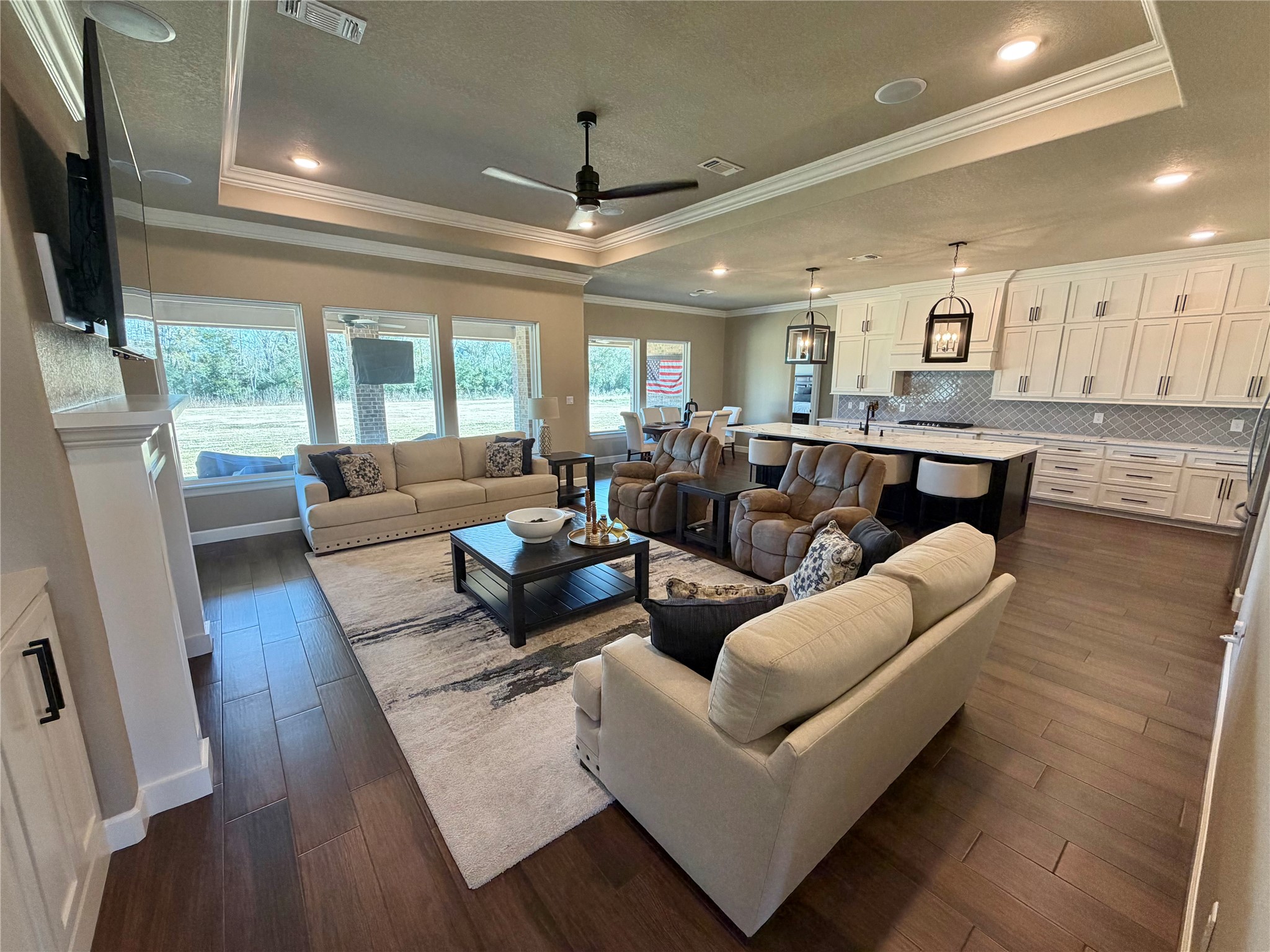 838 Oak Ridge Drive Angleton, TX 77515 - Photo 8 of 49 a living room with furniture wooden floor and a flat screen tv