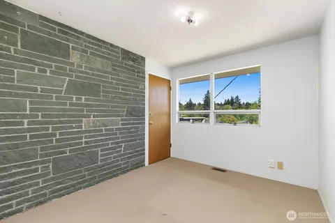 a view of wall with window