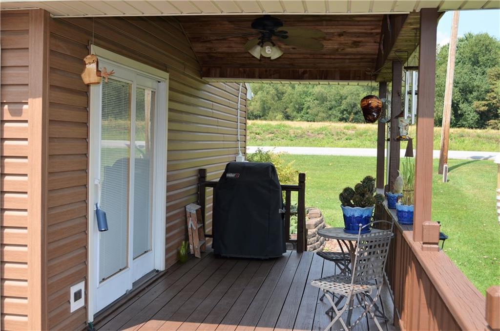210 Jones Road Cabot, PA 16023 - Photo 19 of 25 Covered area 8x14 off of the dining room to make grilling easy in any season!