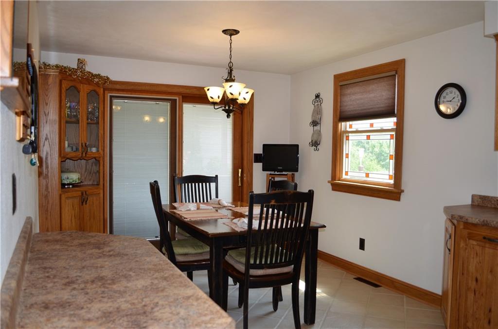 210 Jones Road Cabot, PA 16023 - Photo 8 of 25 The corner hutch is built in and the Pella sliding door leads to the side wrap around deck!