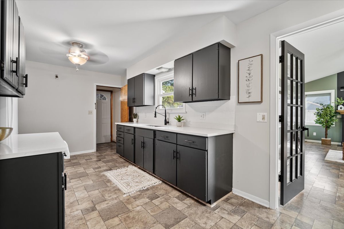 415 Bradley Lane Normal, IL 61761 - Photo 12 of 28 a spacious bathroom with a double vanity sink a mirror and a shower