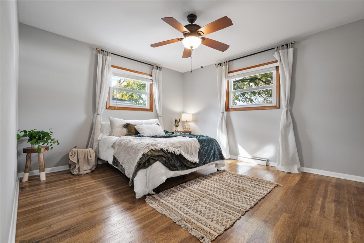 415 Bradley Lane Normal, IL 61761 - Photo 16 of 28 a bedroom with a large bed and a window