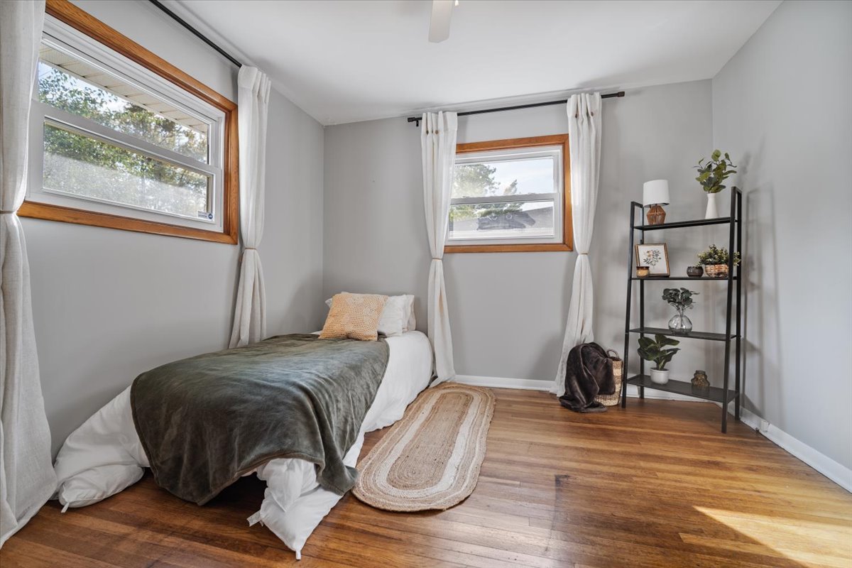 415 Bradley Lane Normal, IL 61761 - Photo 17 of 28 a bedroom with a bed and a window