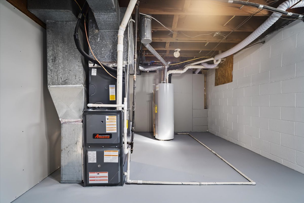 415 Bradley Lane Normal, IL 61761 - Photo 27 of 28 a view of an empty room with wooden floor