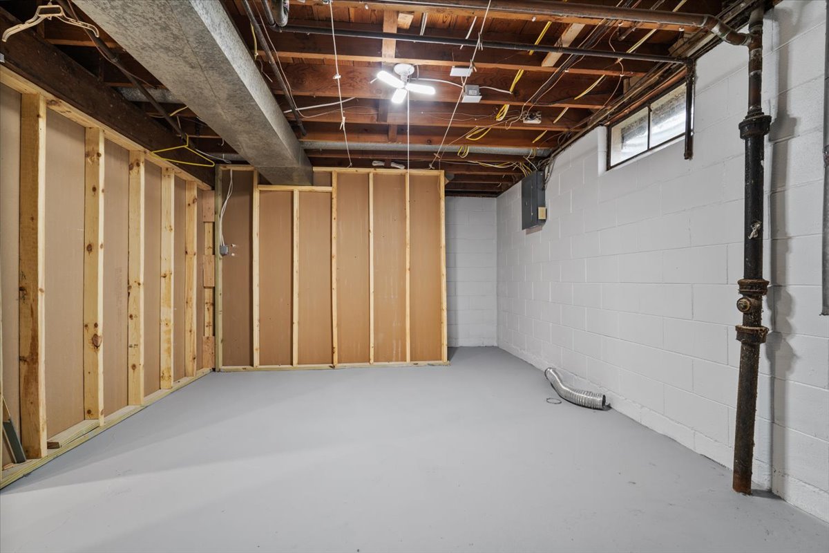 415 Bradley Lane Normal, IL 61761 - Photo 28 of 28 a view of hallway with wooden walls