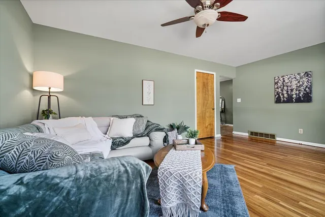 a bed room with a bed and a chandelier