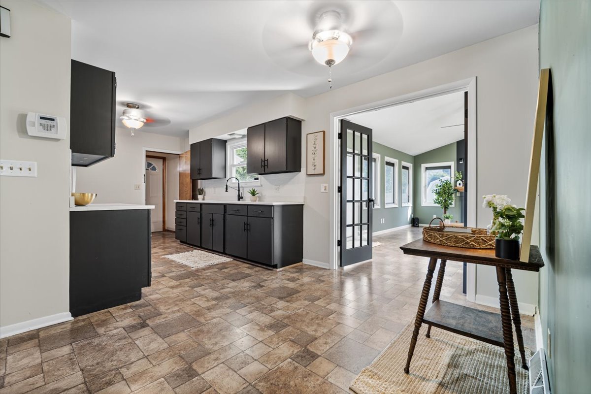 415 Bradley Lane Normal, IL 61761 - Photo 5 of 28 a view of kitchen with livingroom and furniture