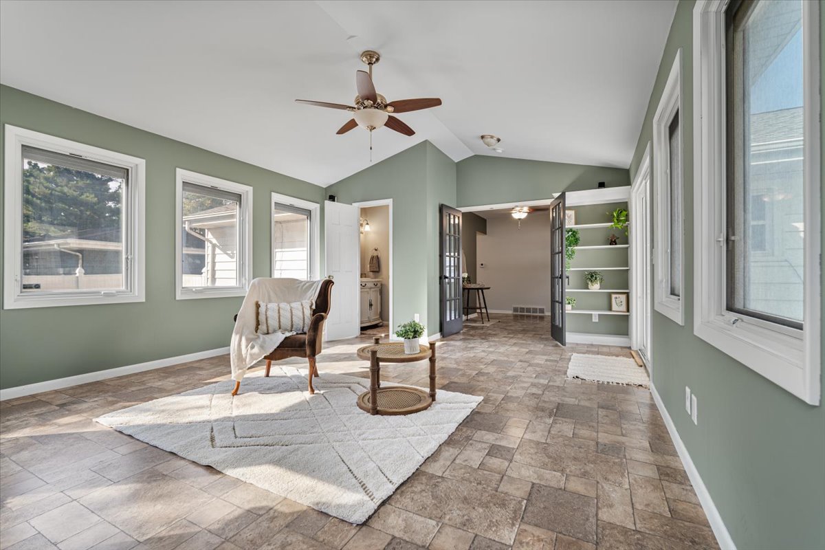 415 Bradley Lane Normal, IL 61761 - Photo 8 of 28 a view of a livingroom with furniture and windows