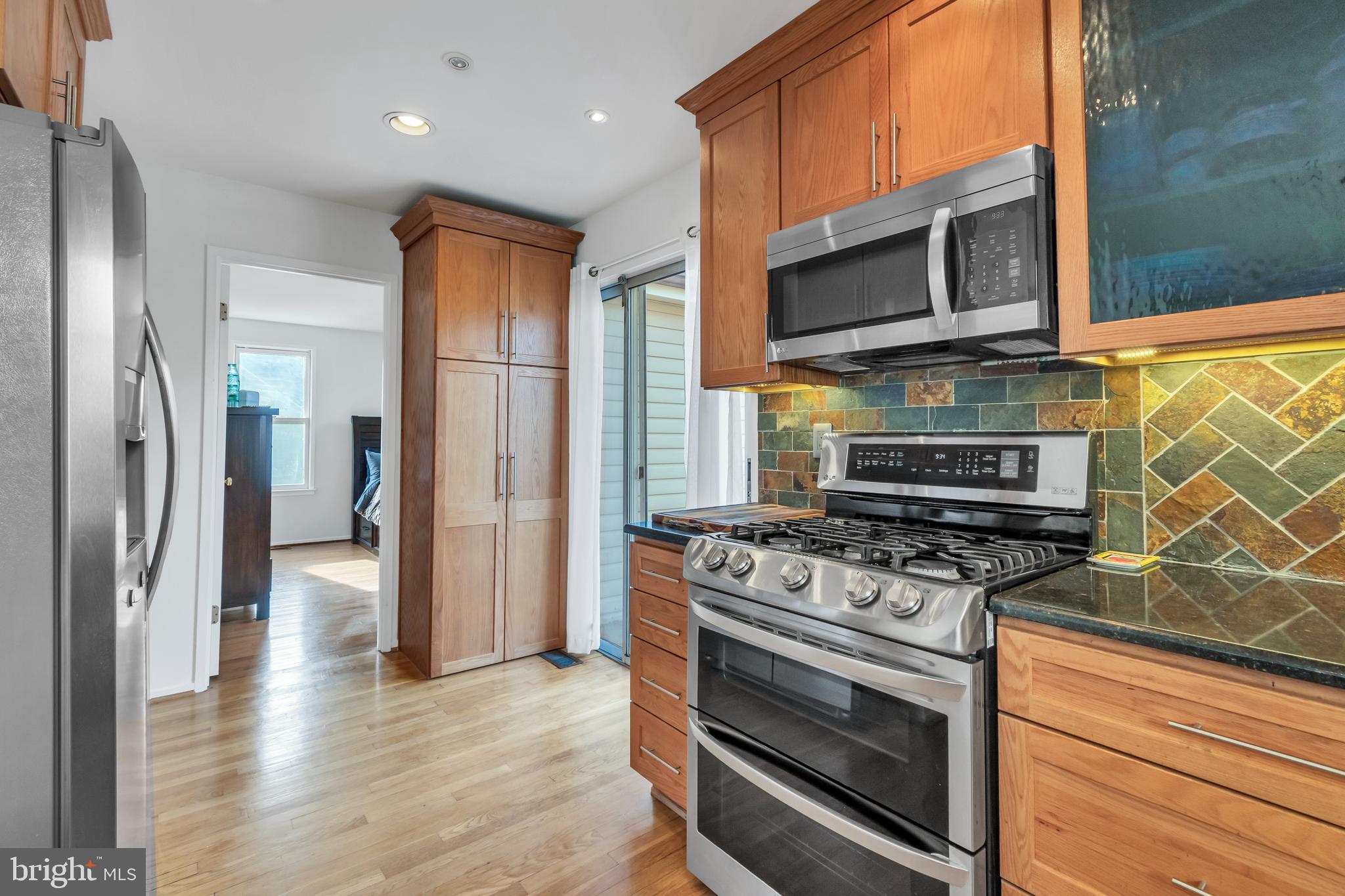 10019 Pratt Place Silver Spring, MD 20910 - Photo 11 of 28 Kitchen
(Pantry and primary bedroom visible)
