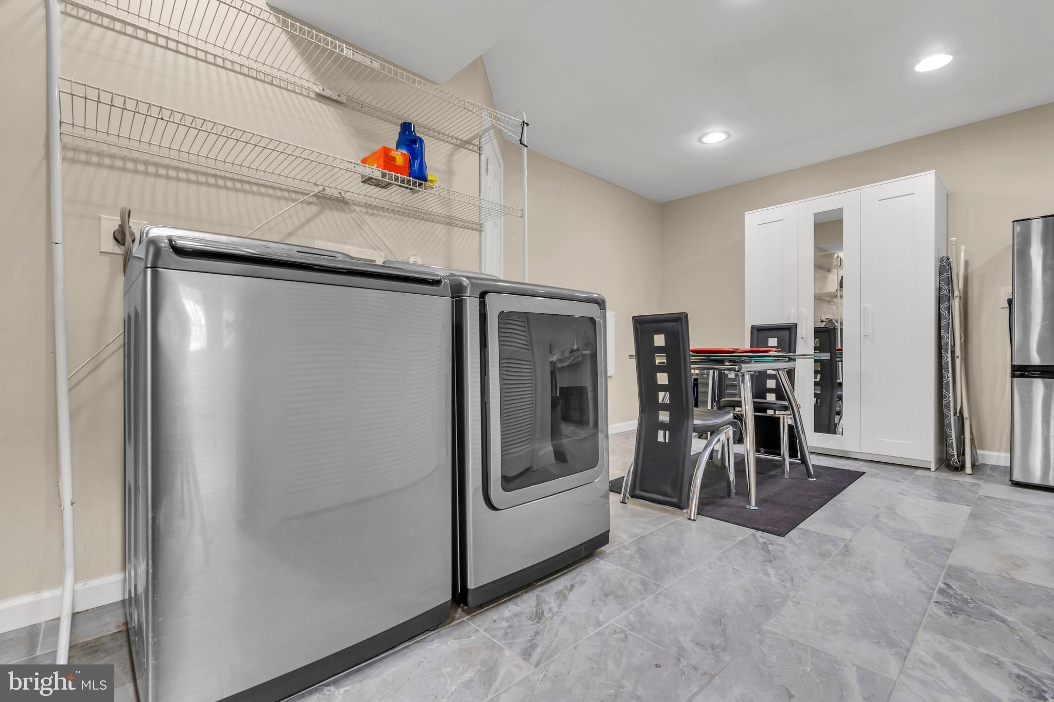 10019 Pratt Place Silver Spring, MD 20910 - Photo 21 of 28 Laundry Area and basement level with heated tile