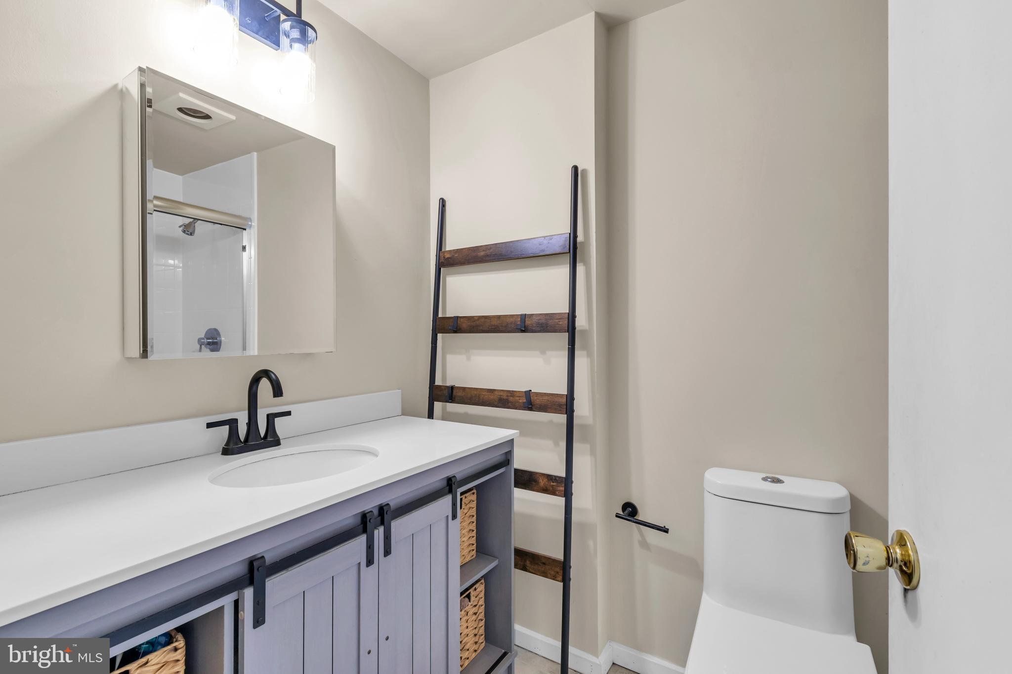 10019 Pratt Place Silver Spring, MD 20910 - Photo 22 of 28 Lower Level Bathroom
(Full bathroom with heater)