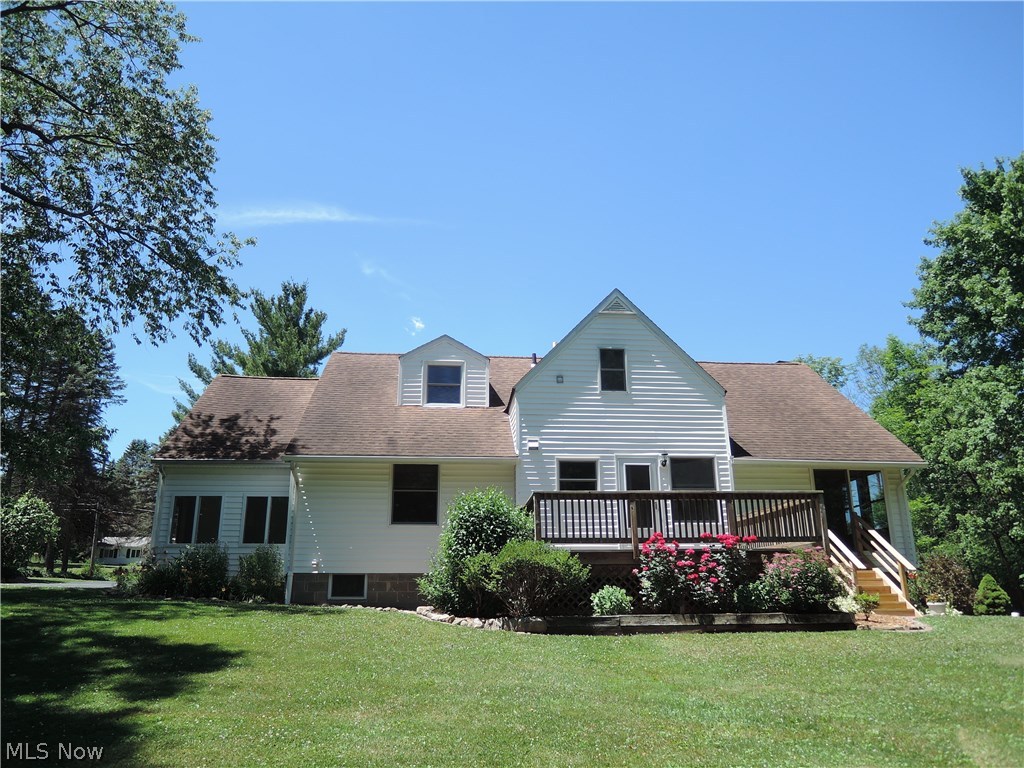 12853 Heath Road Chesterland, OH 44026 - Photo 7 of 28 Back of the house showing roses and other perennials .