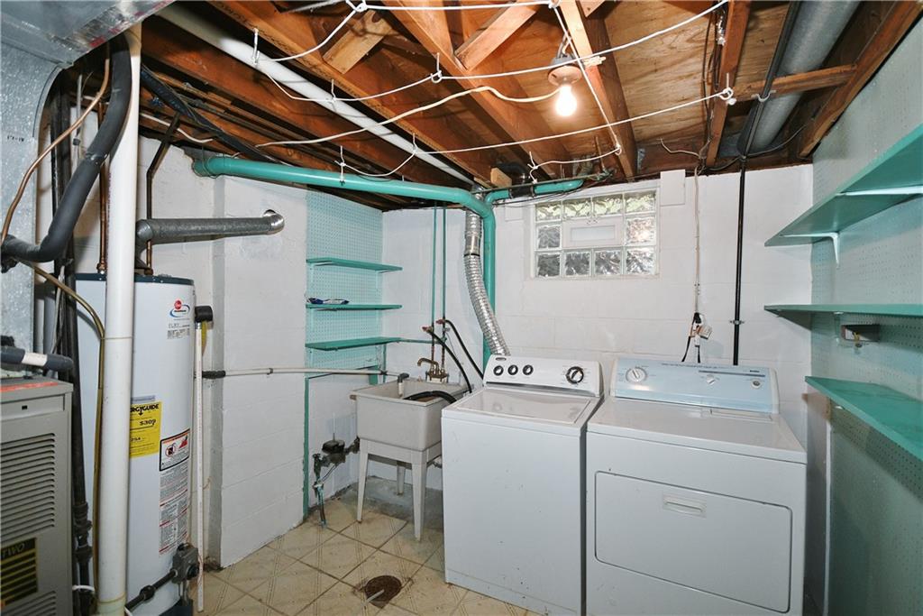 177 Parkedge Road Pittsburgh, PA 15220 - Photo 24 of 25 The laundry has good shelving for storage and a finished floor. The washer dryer come with the house so you don't have to worry about finding them.