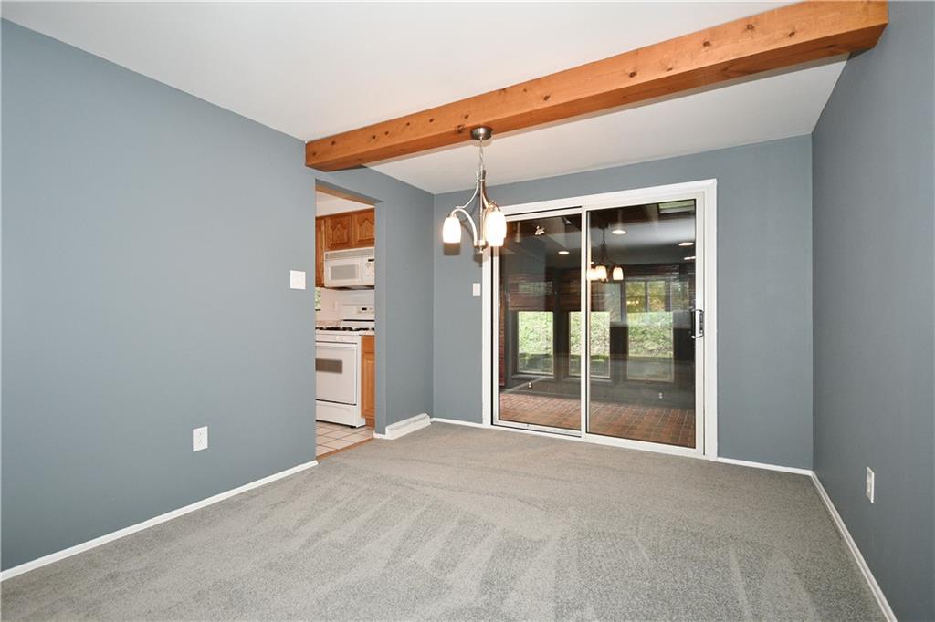 177 Parkedge Road Pittsburgh, PA 15220 - Photo 7 of 25 The dining room is a good size and opens to the kitchen and the four season room.