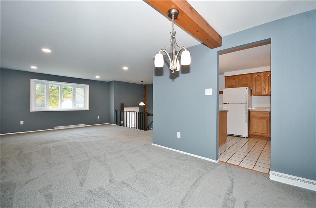 177 Parkedge Road Pittsburgh, PA 15220 - Photo 8 of 25 The recessed lighting in the living room is a nice amenity and the dining room chandelier is just waiting for your table to be added!