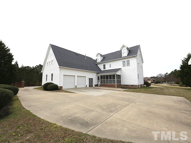 1009 Fieldgrass Place Raleigh, NC 27603 - Photo 11 of 12 a house view with a outdoor space