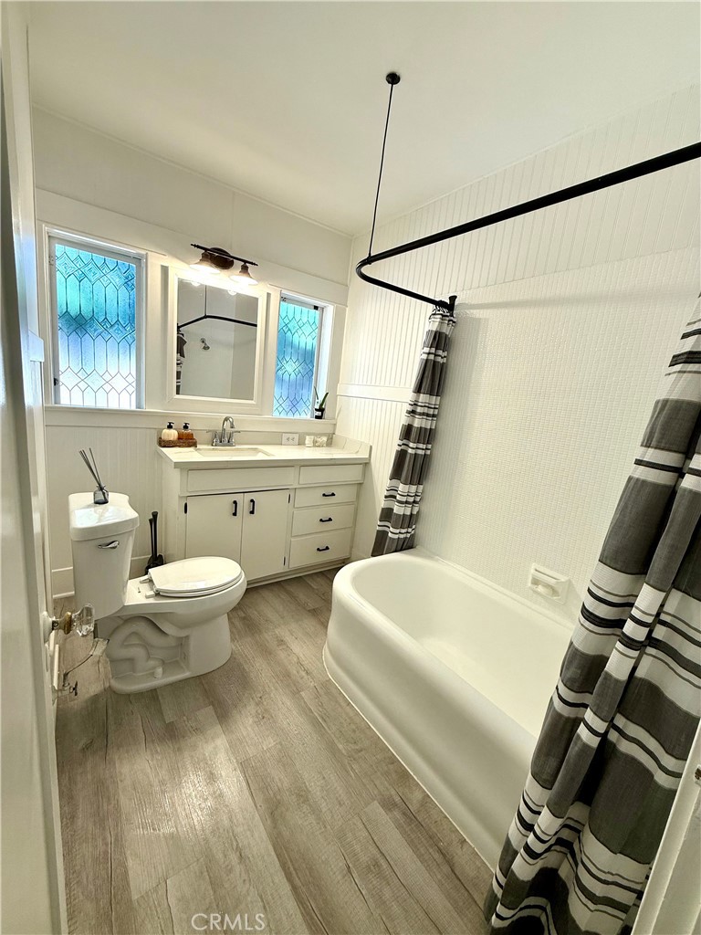 6226 Washington Whittier, CA 90601 - Photo 11 of 21 a bathroom with a sink a toilet and bathtub