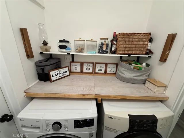 a view of cabinets with chair and wooden floor
