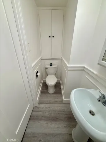 a bathroom with a sink and toilet