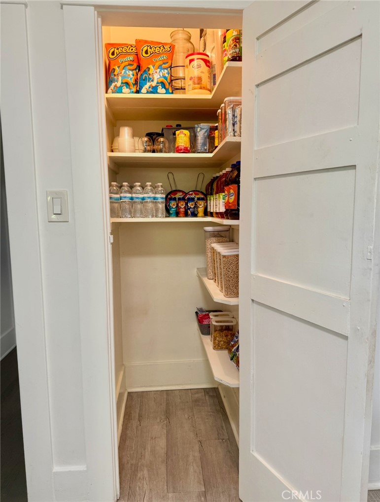 6226 Washington Whittier, CA 90601 - Photo 6 of 21 a view of walk in closet with clothes and shoes