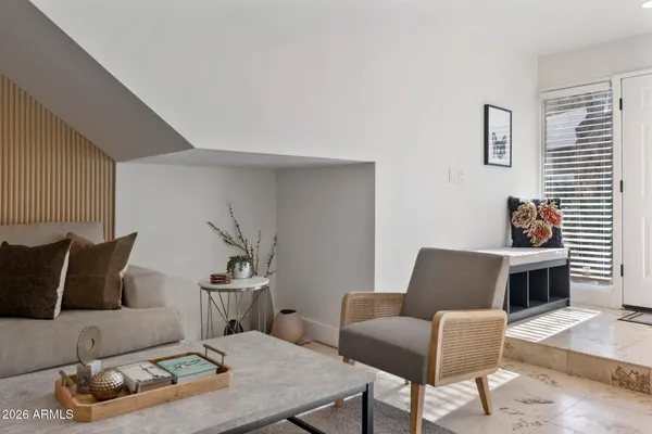 a living room with furniture and a couch