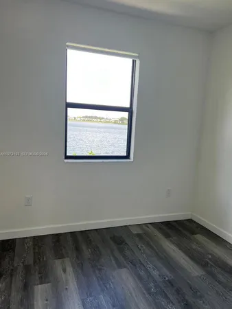 a view of a lake from a balcony