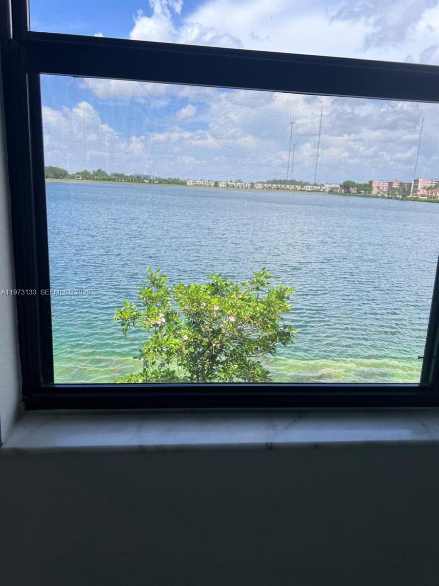 20564 Northeast 5th Place Miami, FL 33179 - Photo 24 of 38 a view of a lake from a balcony