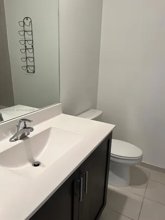a white bath tub sitting in a bathroom