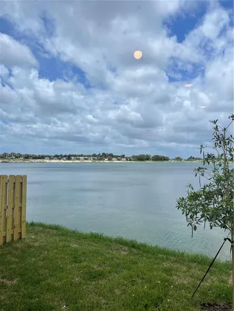 a view of a lake from a yard