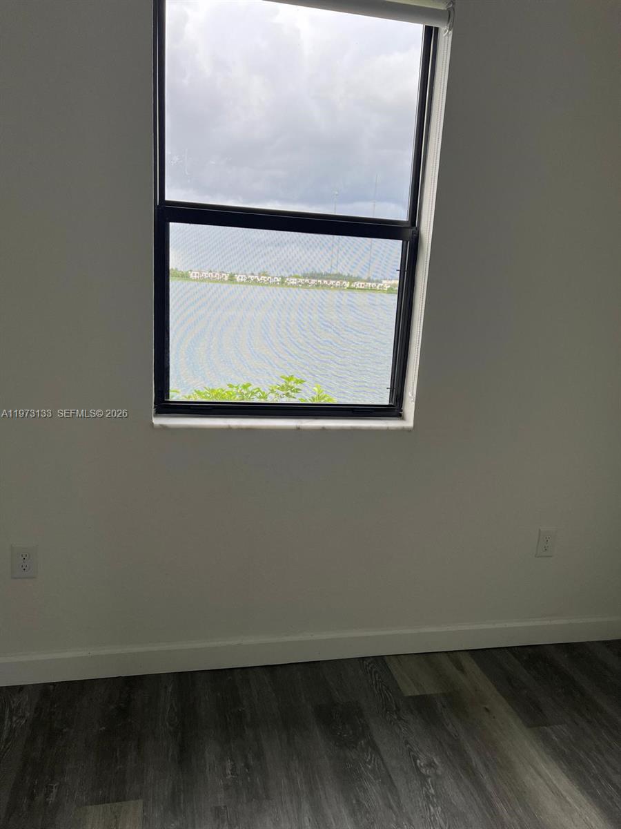 20564 Northeast 5th Place Miami, FL 33179 - Photo 35 of 38 an empty room with a window