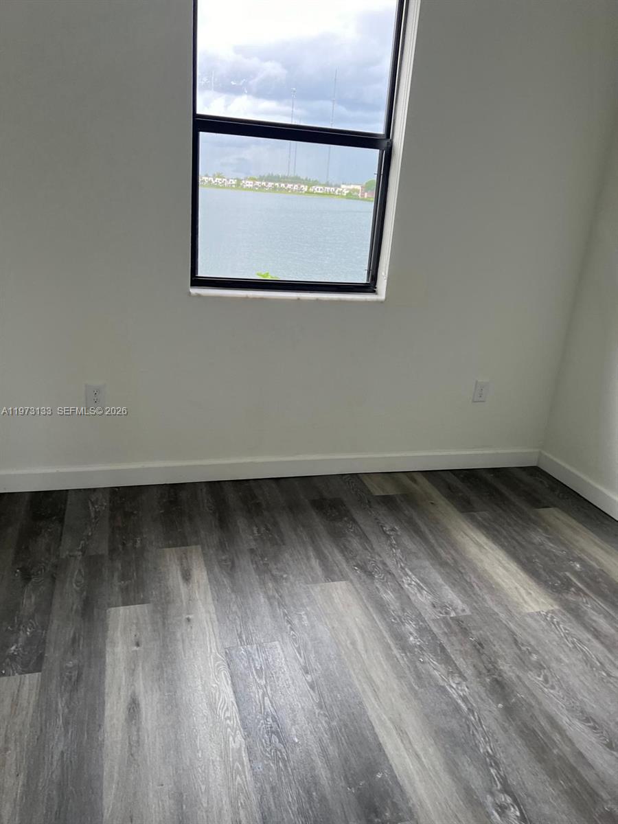20564 Northeast 5th Place Miami, FL 33179 - Photo 38 of 38 a view of a wooden floor