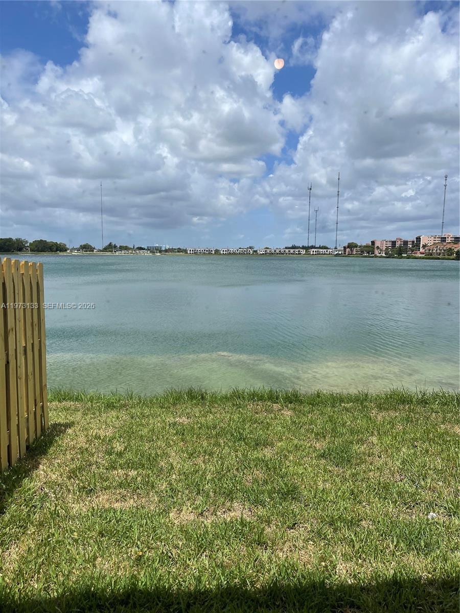 20564 Northeast 5th Place Miami, FL 33179 - Photo 9 of 38 a view of a lake and a yard