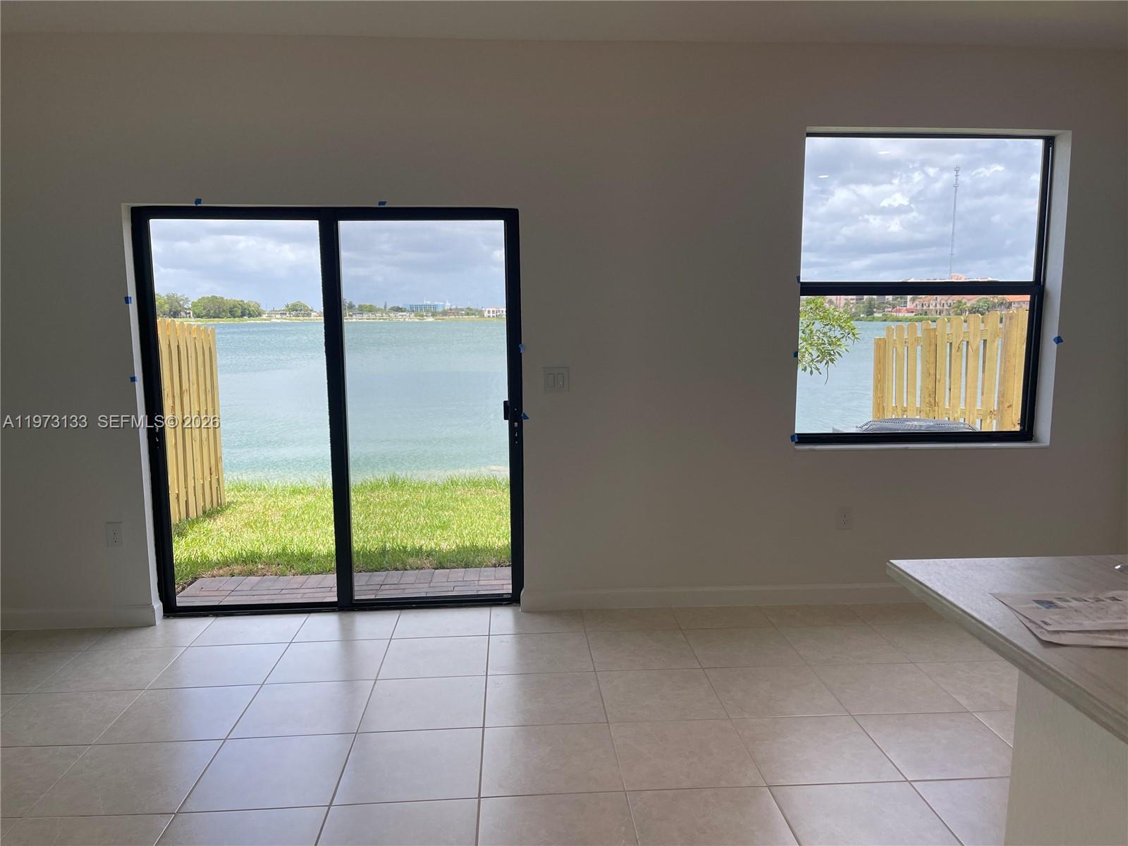 20564 Northeast 5th Place Miami, FL 33179 - Photo 10 of 38 a view of an empty room with window