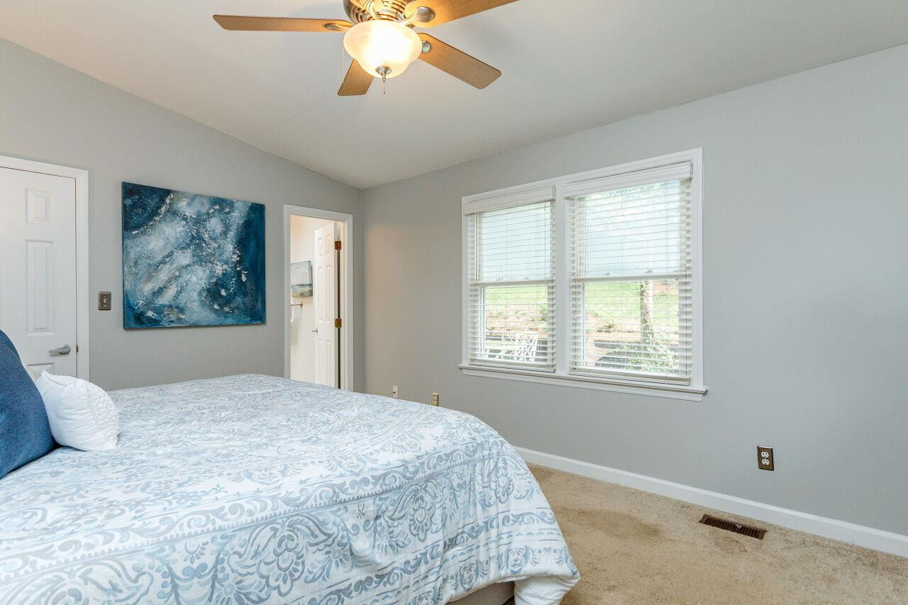 3018 Medlin Drive Raleigh, NC 27607 - Photo 18 of 30 Light and bright, look out over the private backyard and large deck outdoors Master Bedroom