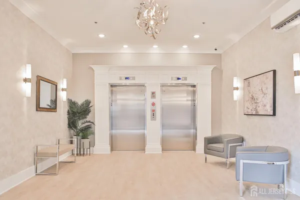 a spacious bathroom with a double vanity sink and a mirror