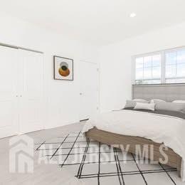 175 Quincy Court, Unit B406 Hopelawn, NJ 08861 - Photo 5 of 12 a view of a kitchen with a sink
