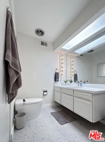 a bathroom with a sink and a bathtub