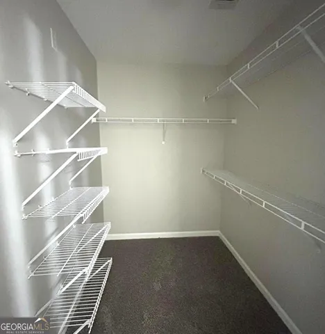 a view of a room with racks on the wall