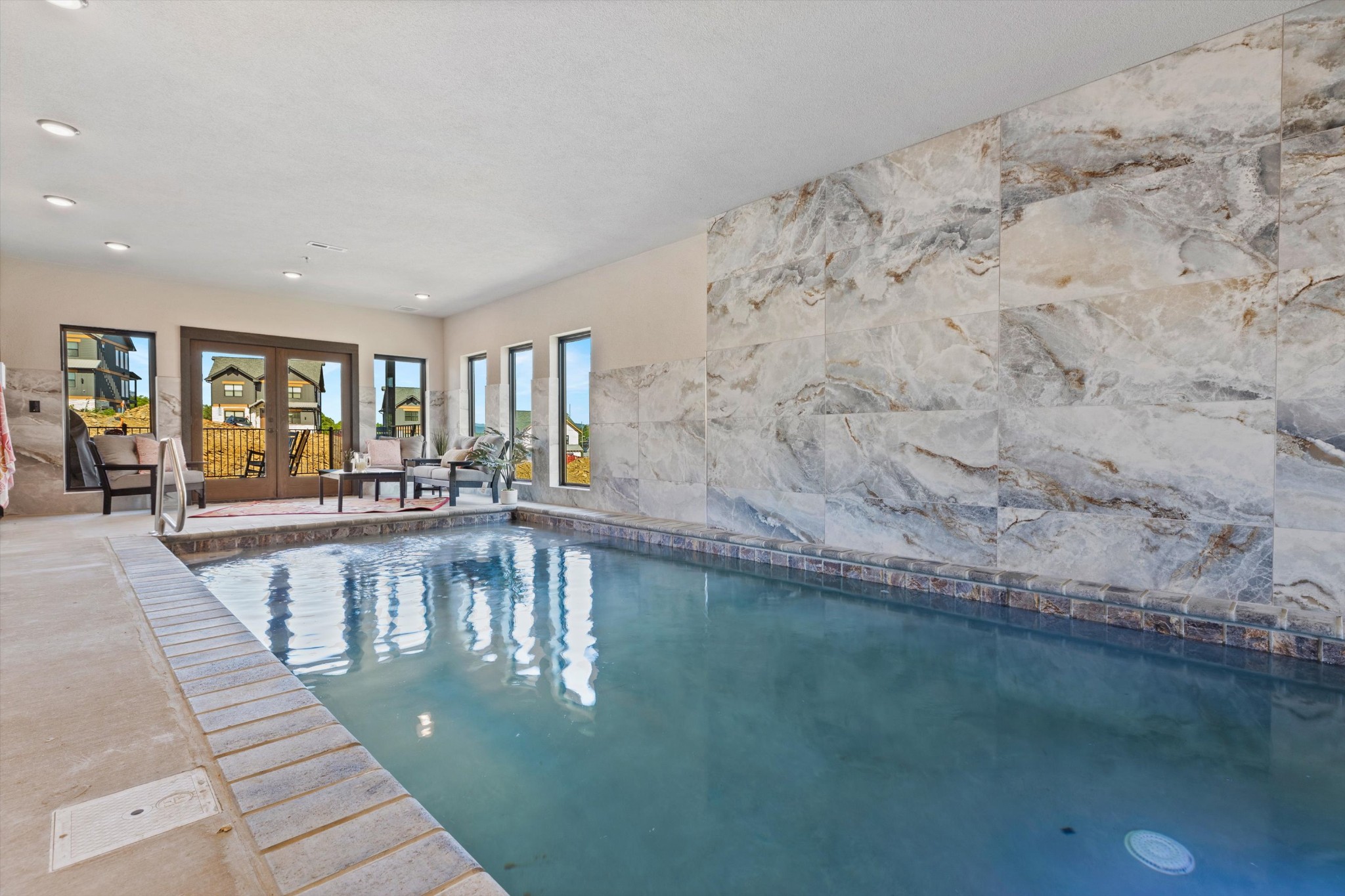56 R Rambling Crk Way Sevierville, TN 37862 - Photo 27 of 54 a view of a living room with a swimming pool