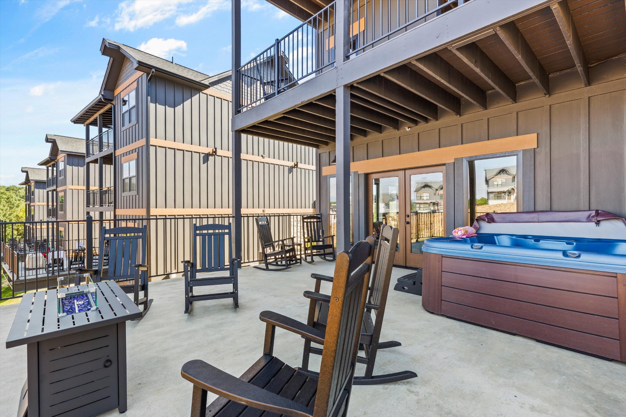 56 R Rambling Crk Way Sevierville, TN 37862 - Photo 32 of 54 a view of an chairs and tables in the patio
