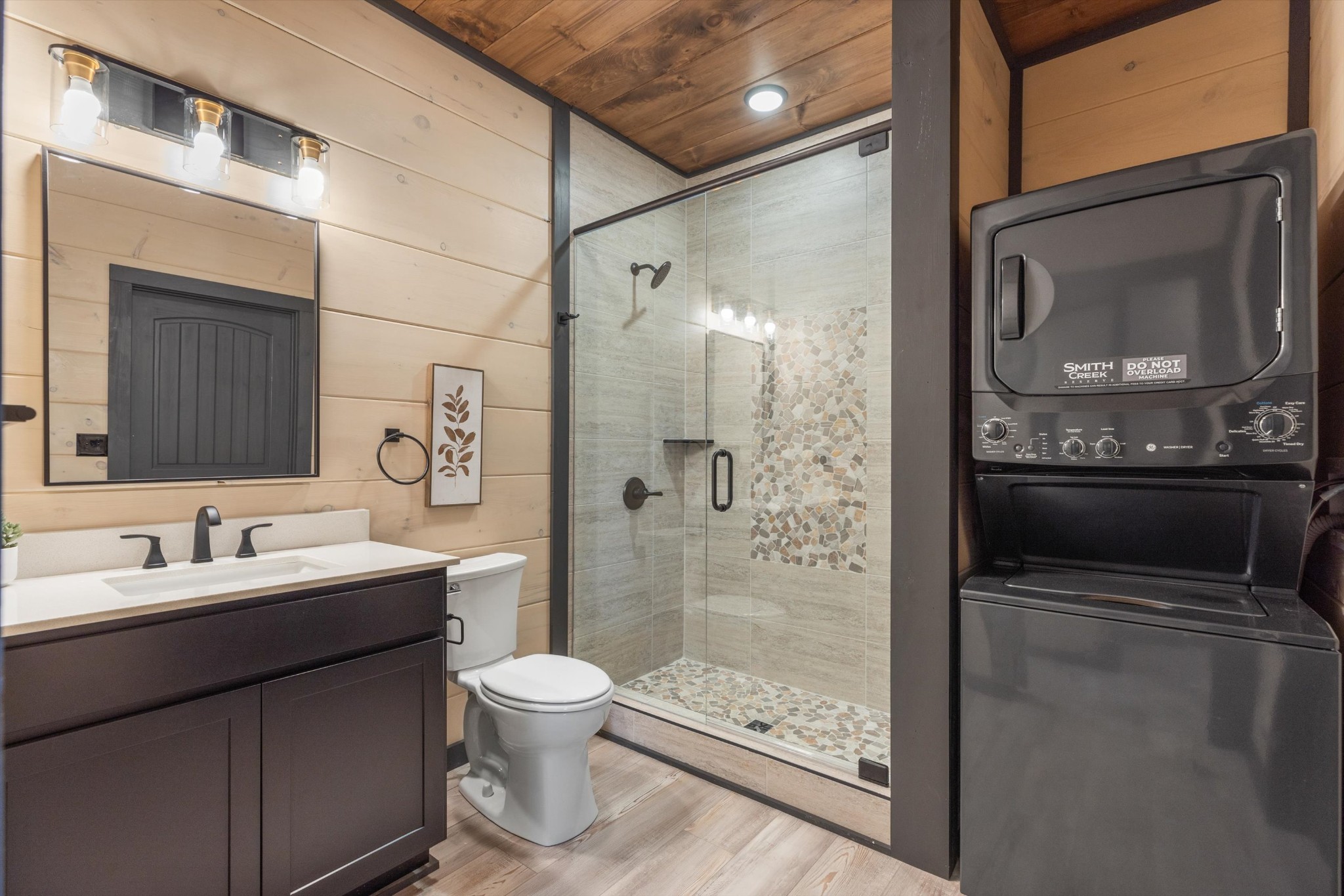 56 R Rambling Crk Way Sevierville, TN 37862 - Photo 34 of 54 a bathroom with a sink a toilet and shower