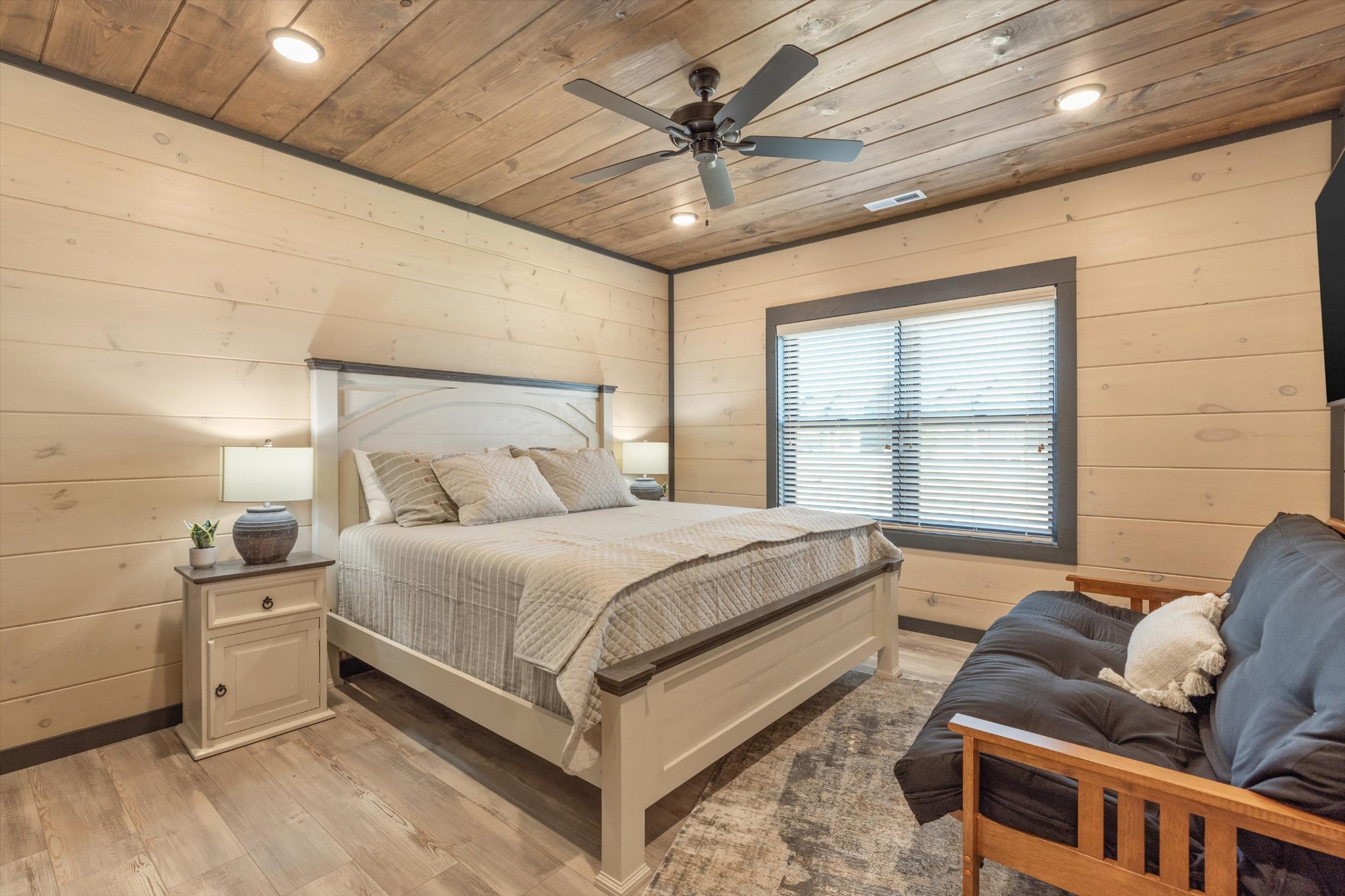 56 R Rambling Crk Way Sevierville, TN 37862 - Photo 50 of 54 a bed room with a bed and a couch
