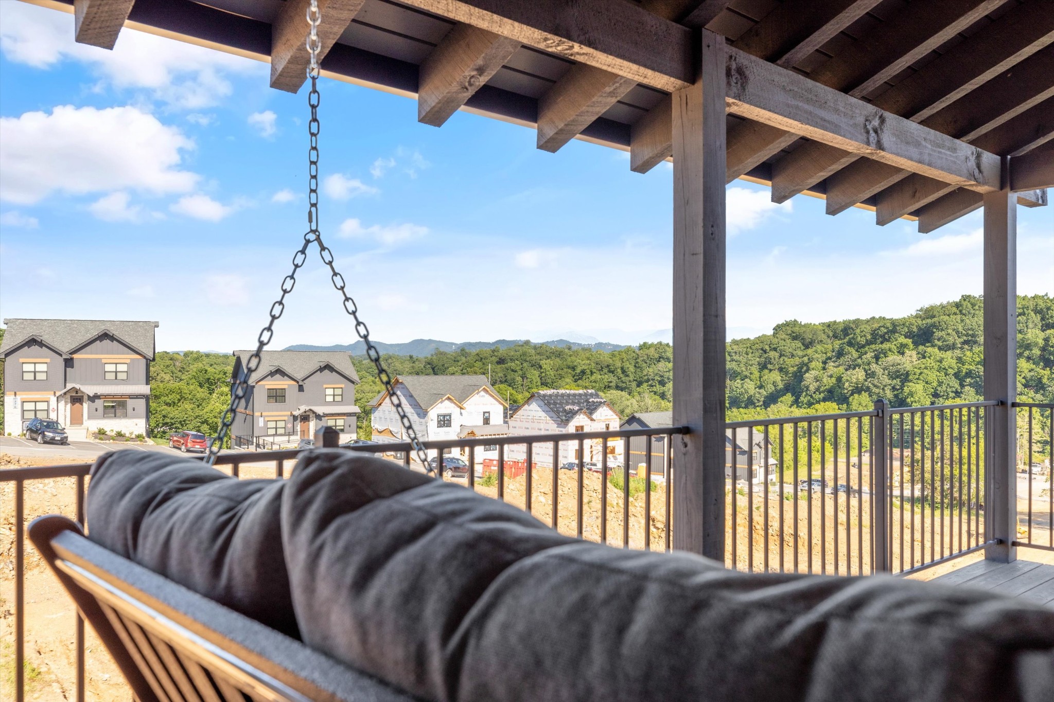 56 R Rambling Crk Way Sevierville, TN 37862 - Photo 53 of 54 a bedroom with a bed and glass window