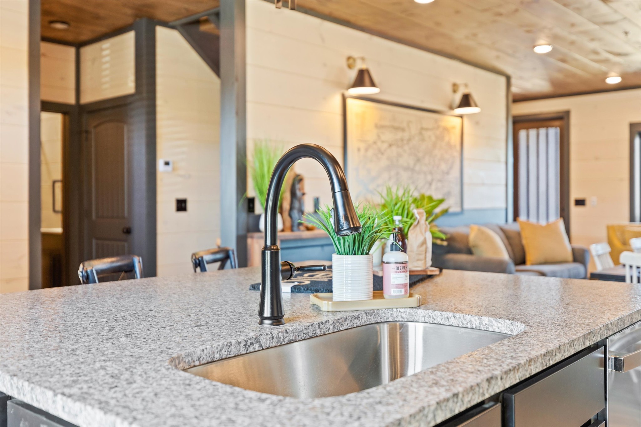 56 R Rambling Crk Way Sevierville, TN 37862 - Photo 6 of 54 a kitchen with granite countertop a sink a counter and a large window