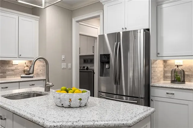 a bathroom with a shower and a sink