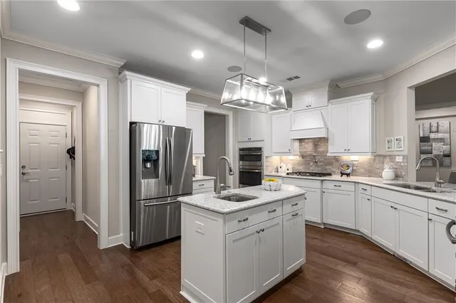 a bedroom with a bed and a ceiling fan