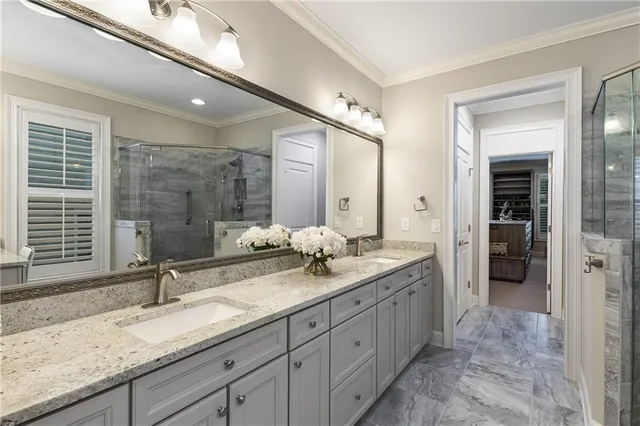 a view of a chair and tables in the balcony